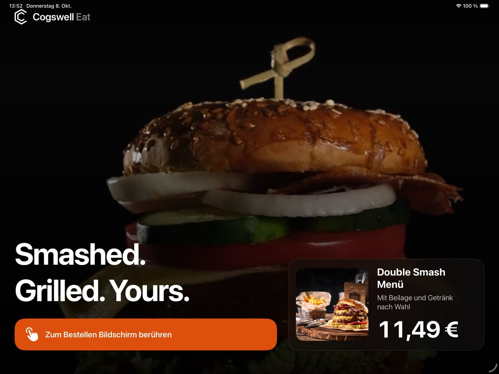 Kiosk-App auf dem iPad: Attract-Screen mit Burger-Foto, „Smashed. Grilled. Yours.“ und Angebot Double Smash Menü für 11,49 €